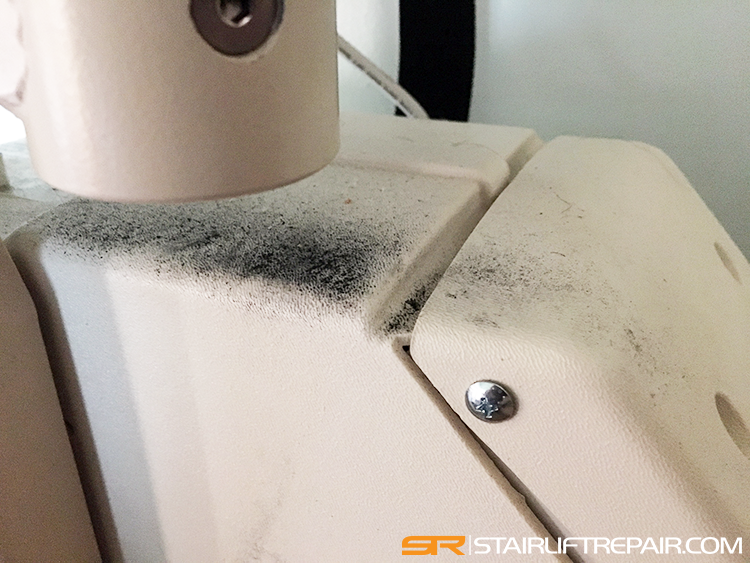 Uneven wear on stairlift parts black dust
